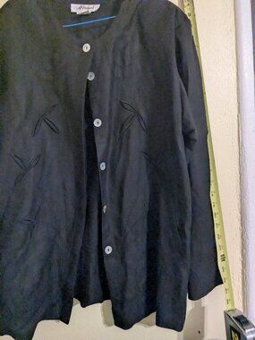 Black top or jacket.
